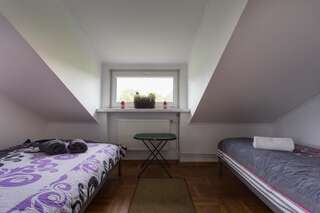 Проживание в семье Rent0nline Brwinow Rooms Brwinów Небольшой двухместный номер с 2 отдельными кроватями - №3-4